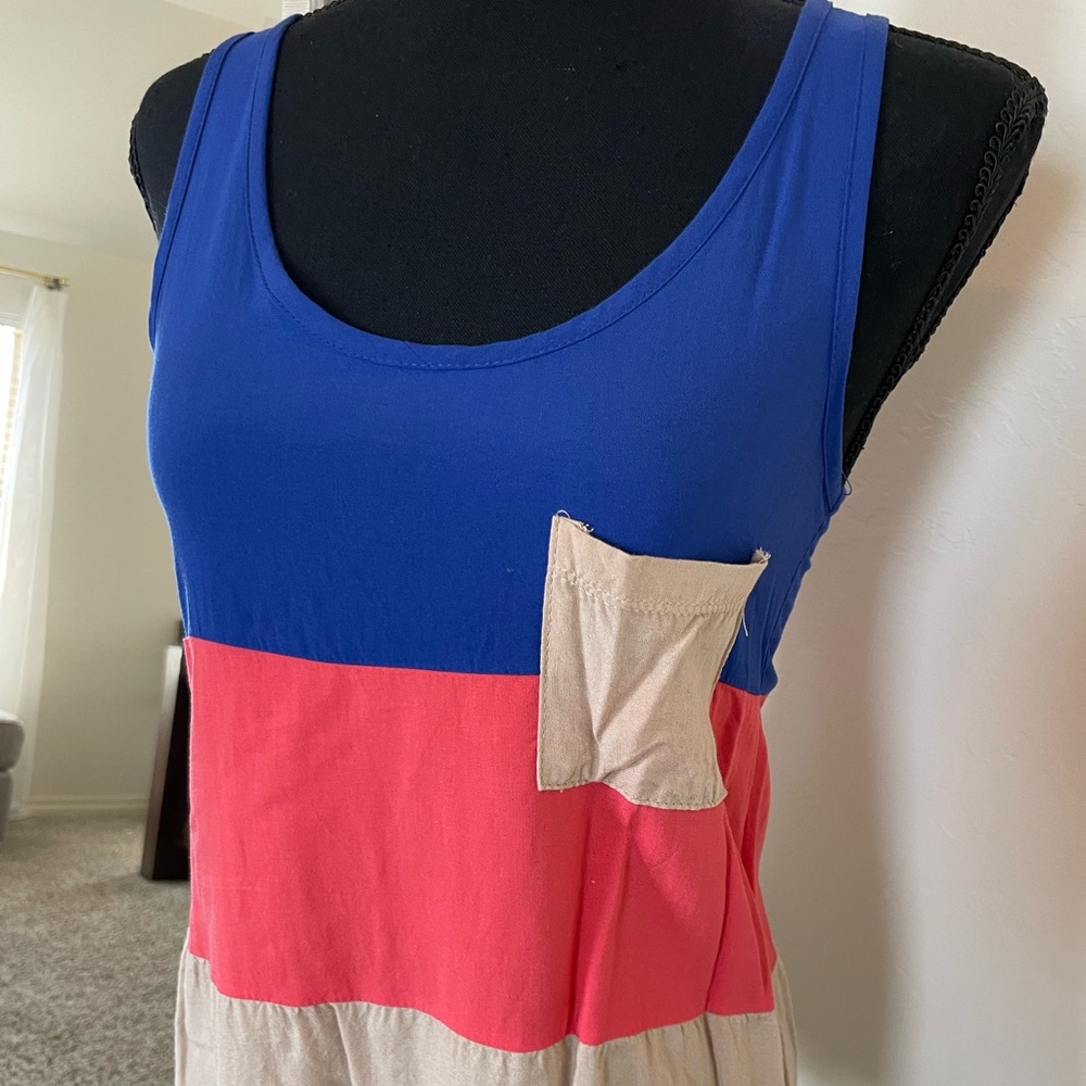 Bright colored freeway tank top with pocket, size small.